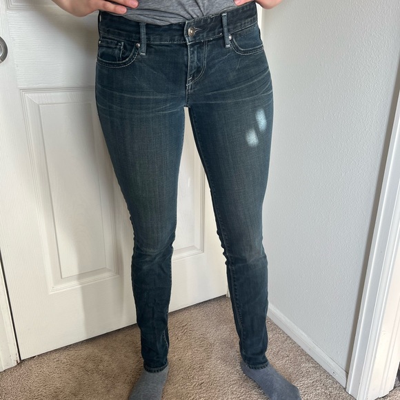 Express dark wash low rise skinny jeans